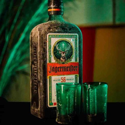 Jagermeister bottle with chilled shot glasses ordered via Tipsy Nepal, showing alcohol delivery service in Nepal