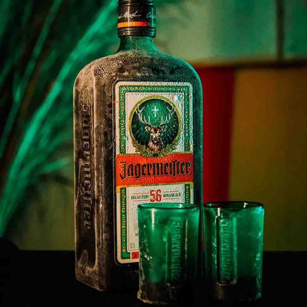 Jagermeister bottle with chilled shot glasses ordered via Tipsy Nepal, showing alcohol delivery service in Nepal