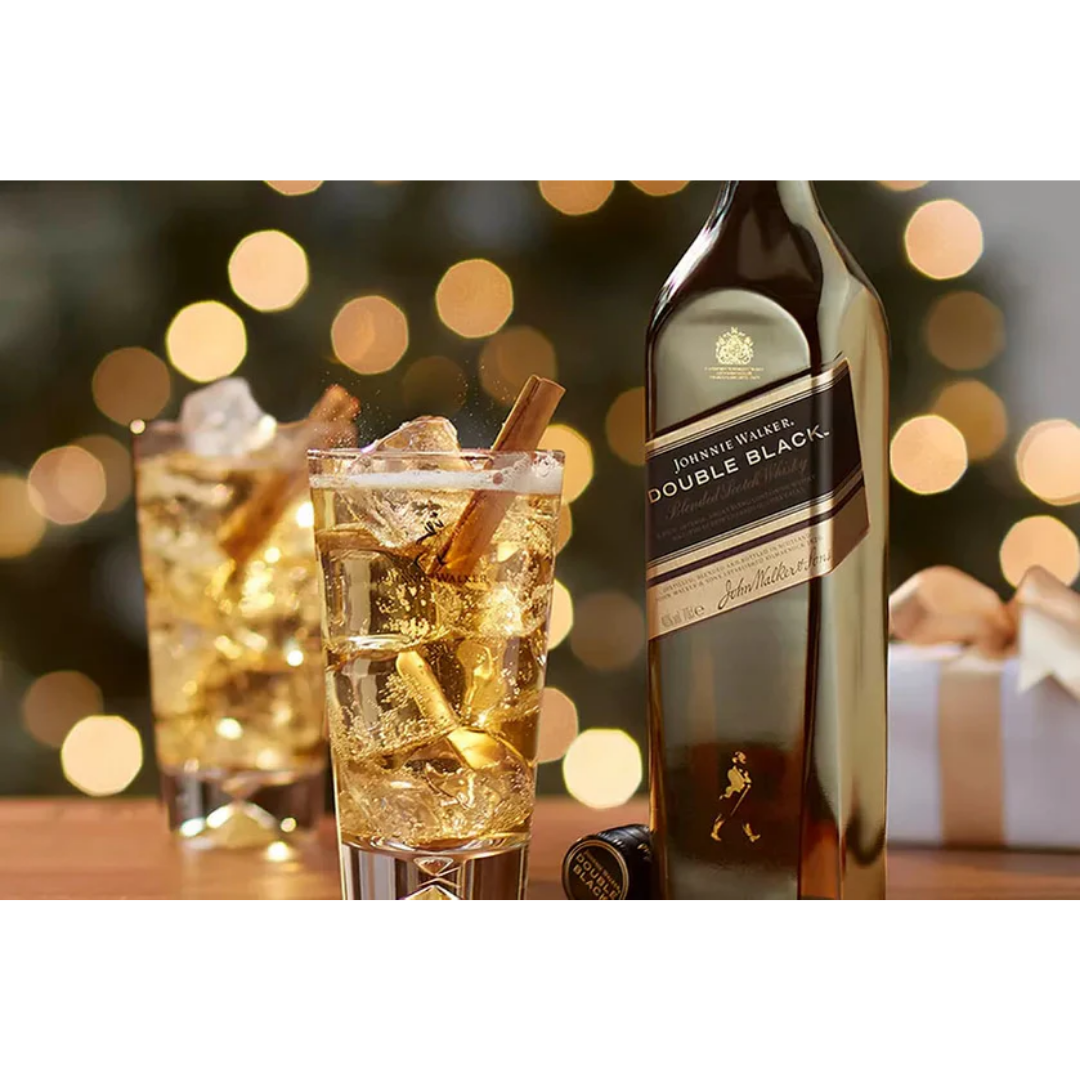 Johnnie Walker Double Black whisky served on ice with warm golden tones, highlighting its smoky taste and bold strength in Nepal