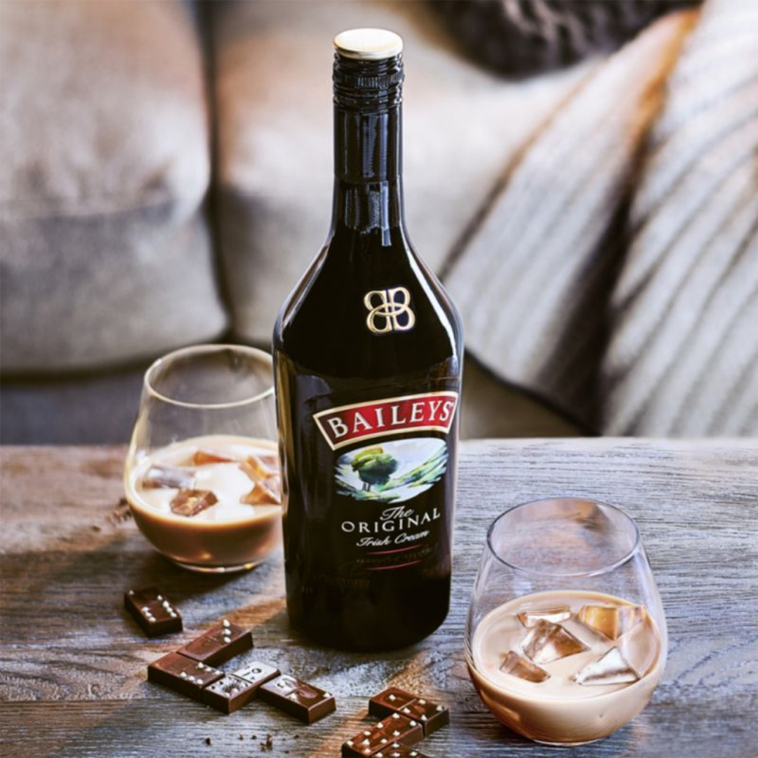 Baileys Irish Cream bottle with glasses on ice showing Baileys price in Nepal available online at Tipsy Nepal
