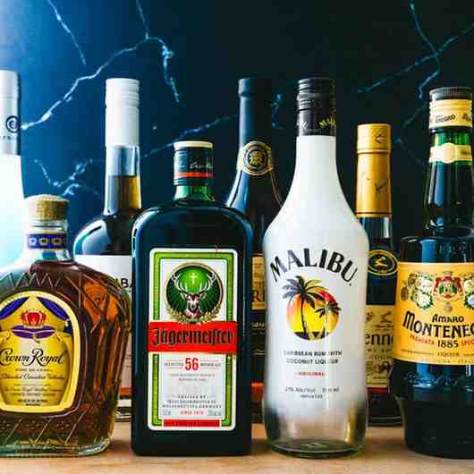 Assorted liquor bottles showing whisky, vodka, and beer brands available in Nepal market 2026